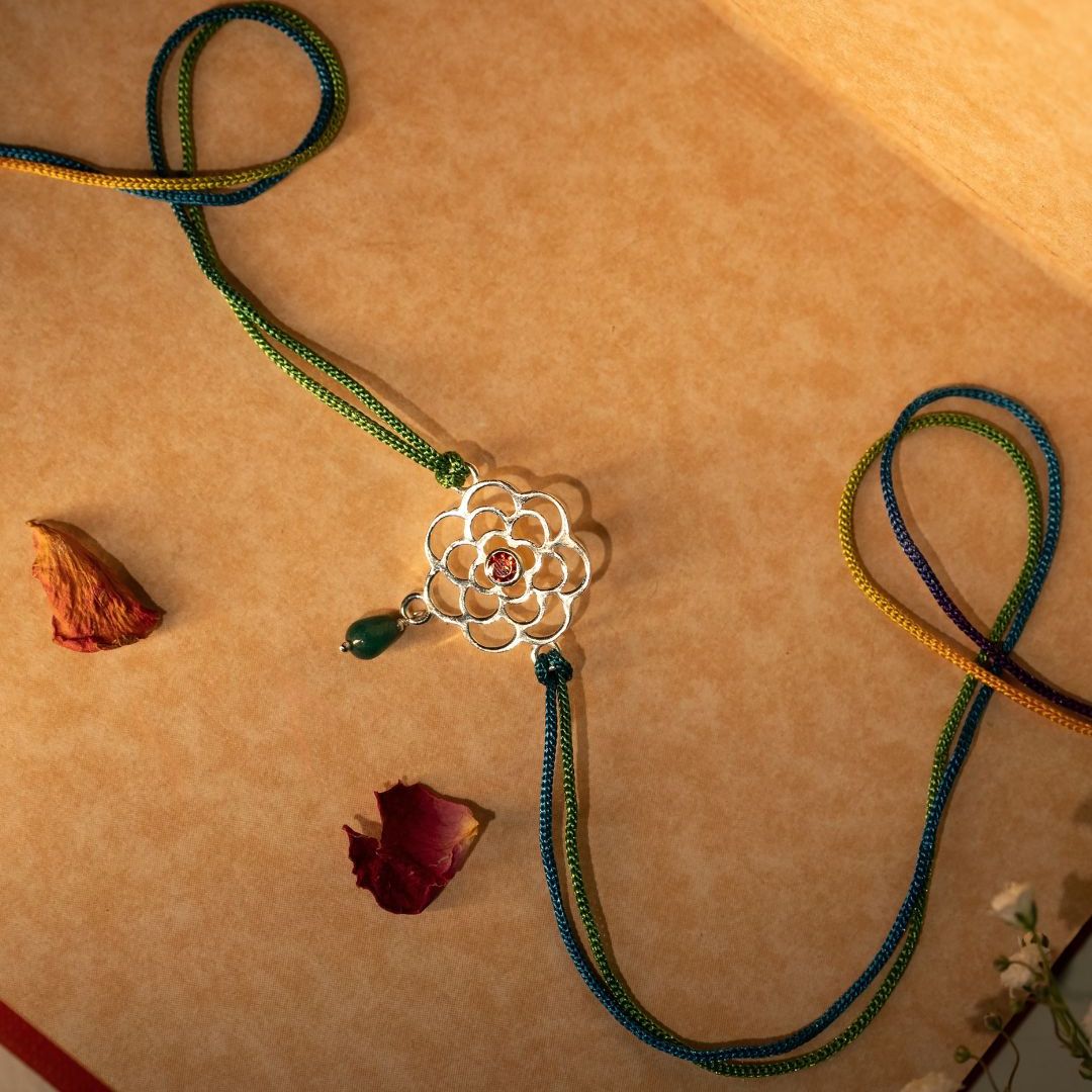 Pushkara Bloom Silver Rakhi