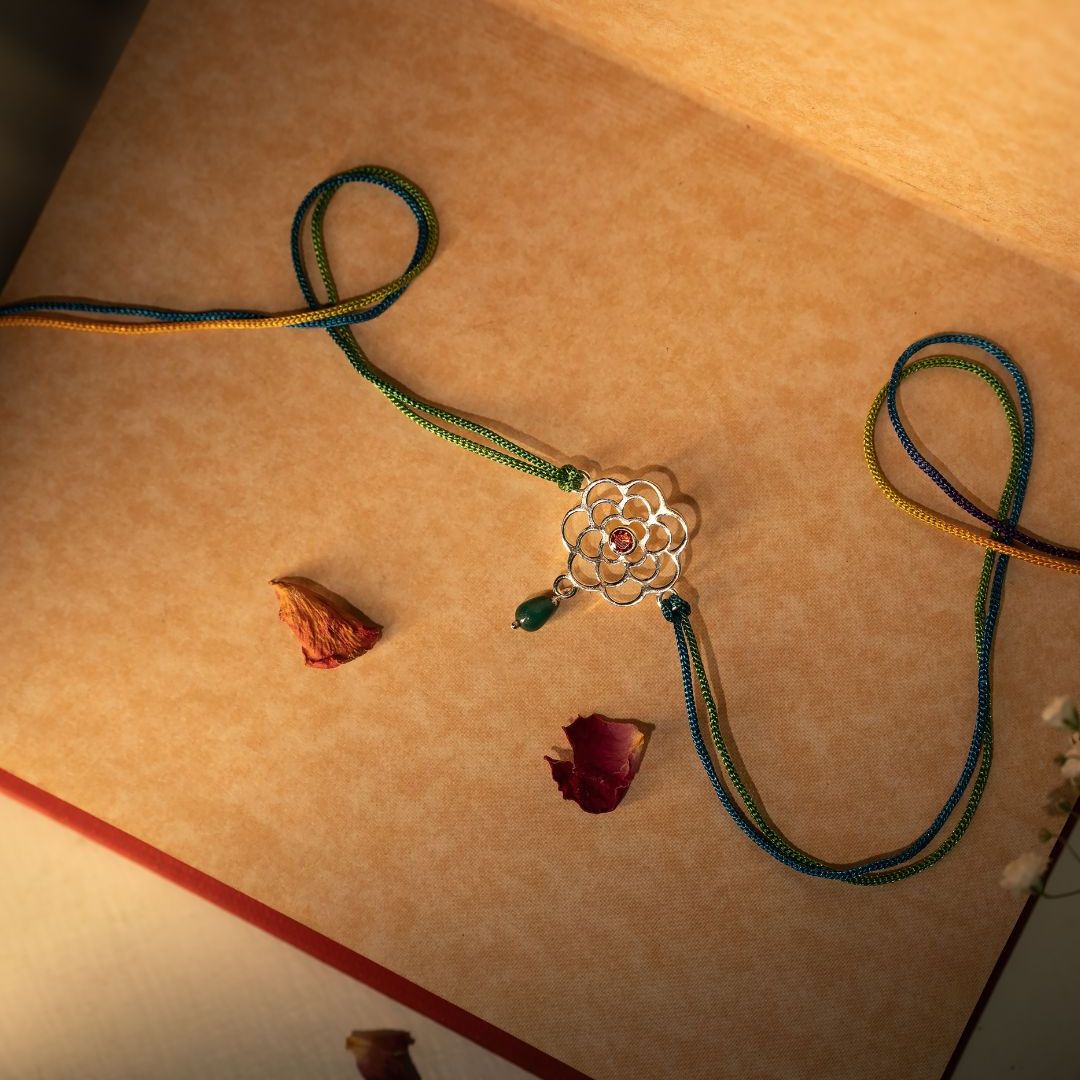 Pushkara Bloom Silver Rakhi